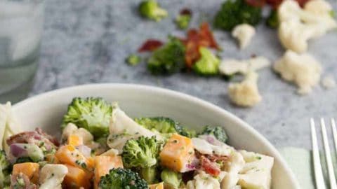 A bowl of creamy Broccoli and Cauliflower Salad