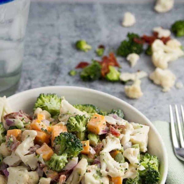 A bowl of creamy Broccoli and Cauliflower Salad