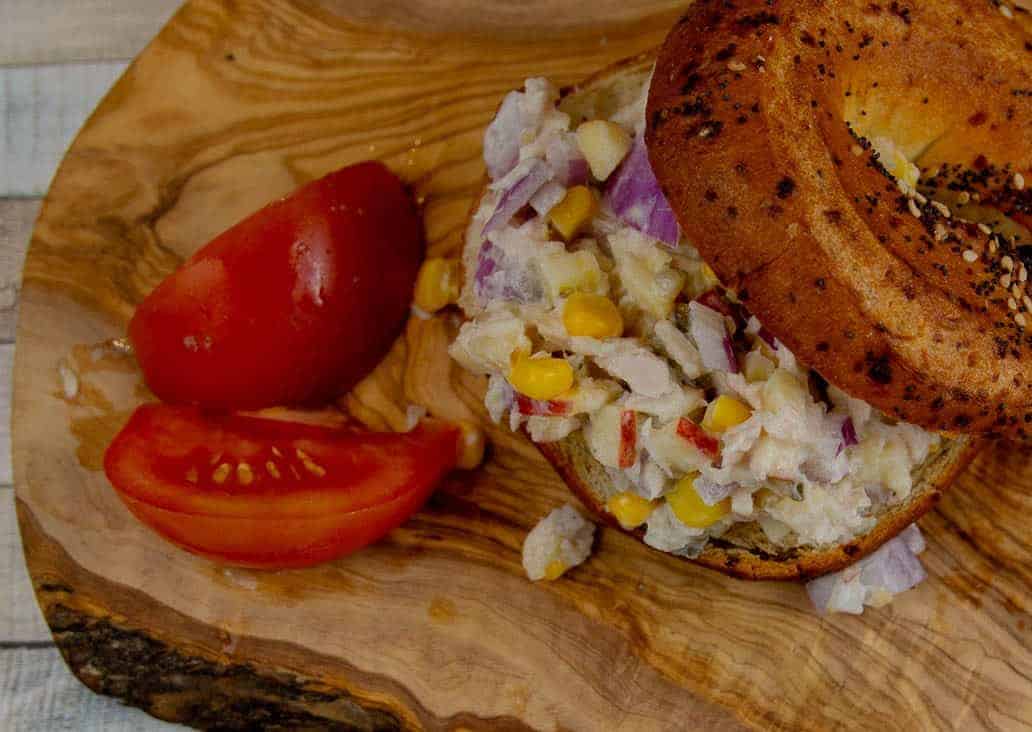 Super Simple Tuna Salad Sandwich recipe on served on a gluten free bagel.