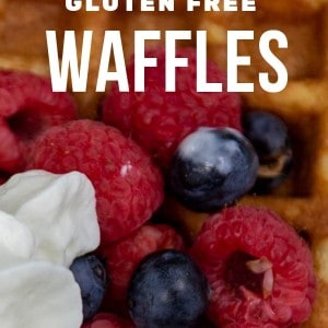 Gluten Free Waffles. Here topped with whipped cream, lemon curd, blueberries, and raspberries.