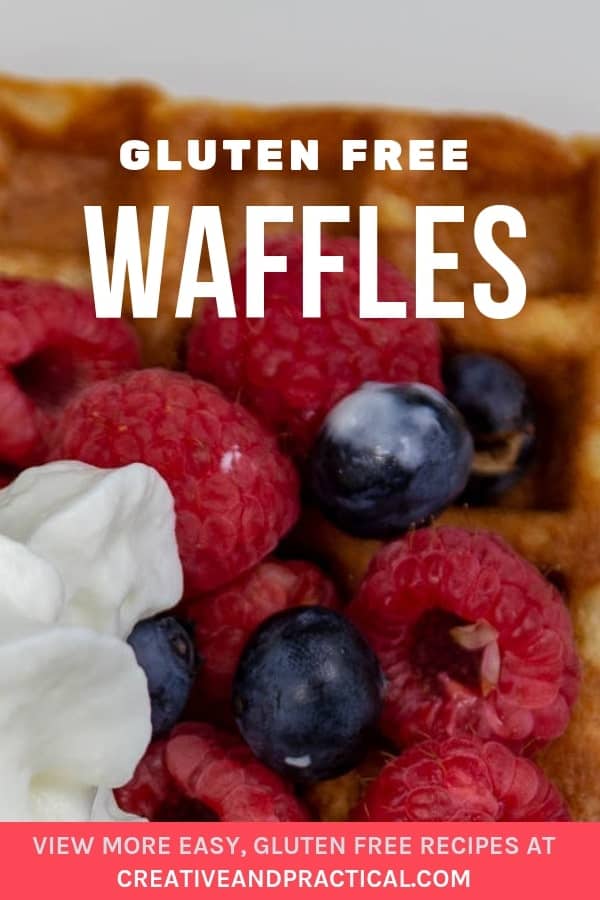 Gluten Free Waffles. Here topped with whipped cream, lemon curd, blueberries, and raspberries.