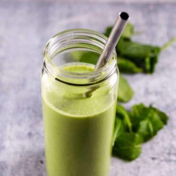 Kale Banana Smoothie served in a wide mouth smoothie glass