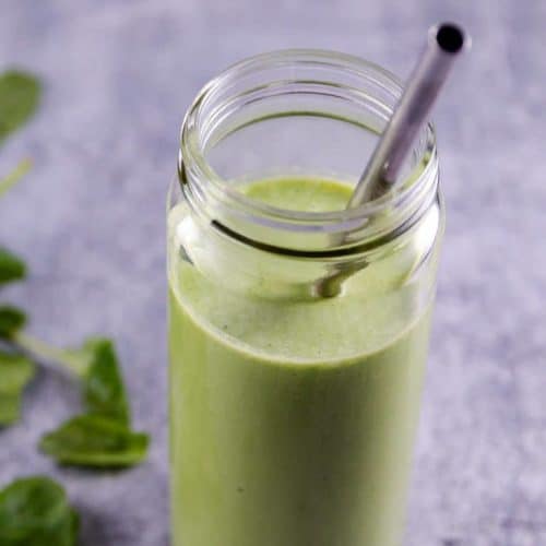 Kale Banana Smoothie served in a wide mouth smoothie glass