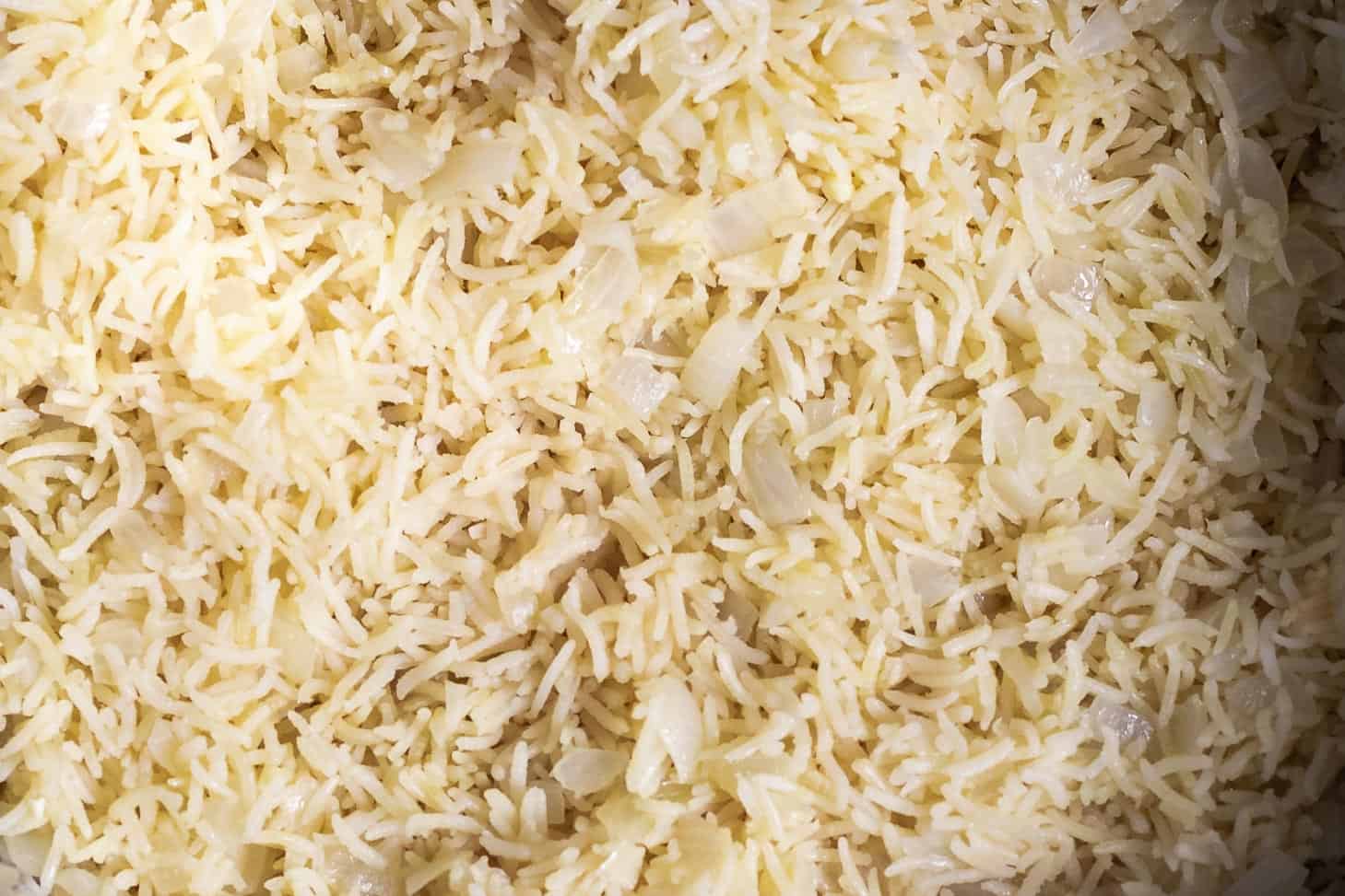 rice cooked with minced garlic and sautéed onions